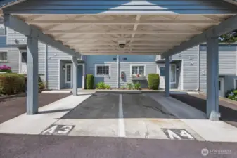 In front covered carport.  A3