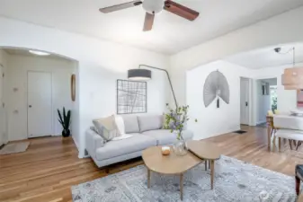This inviting living room is full of natural light.