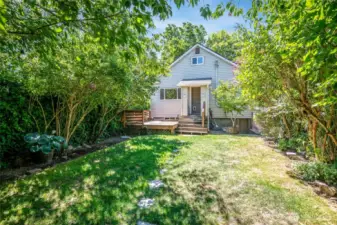 Sprinkler system helps to keep this lush yard feeling like an oasis in the city.