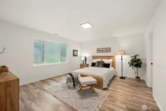 Upstairs spacious primary suite retreat. Window film is removeable.