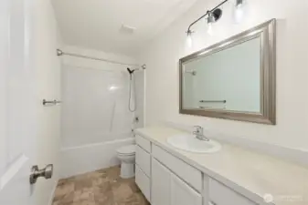 Upstairs full bath. Clean, modern finishes.