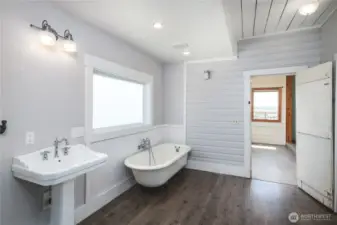 Downstairs bathroom adjoining main level potential primary suite