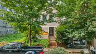 The updated multi-family is fully rented with light-filled, spacious remodeled apartments--each with its own patio/balcony-- five rentable surface parking spaces, and onsite storage units in basement