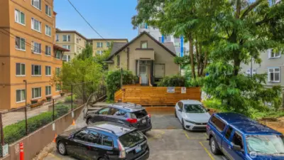 Another view of parking spaces just off the back alley.  Feasibility plans available showing developing the parking into townhomes.