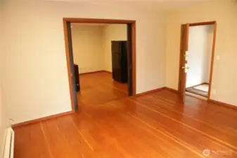 Unit 1 showing entrance and fridge in backround