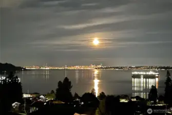 Watch ferries glide across the water and Seattle’s city lights sparkle at night.