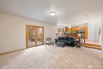 French doors off the family room lead to the covered back porch and large fully fenced back yard.