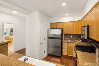 Kitchen with stainless appliances & granite counter-tops