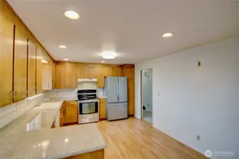 Large kitch with area for more cabinetry, eating nook, etc