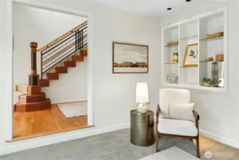 Living room with built-in nook shelving
