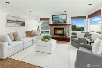 Bonus room with gas fireplace and city view