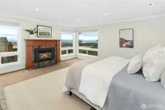 Spacious Primary Bedroom with custom blinds
