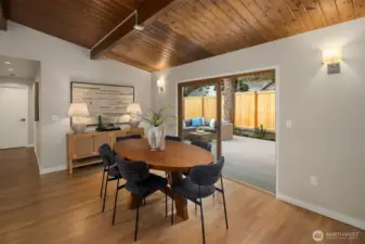 Generous dining room opens through the sliders to the new Trex deck, a seamless blend to the outdoors.