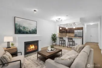 Warm & cozy gas fireplace.  Virtually staged.