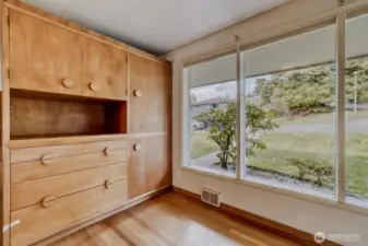 Original built-in cabinet/hutch in the Dining Room gives more of that great MCM vibe. Wall of windows lets you relax and watch the world go by. This is a very friendly and walkable neighborhood.