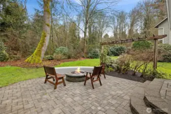 Updated paver patio with gas-piped firepit.