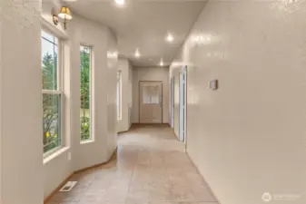 Hallway to 3rd bedroom and laundry room