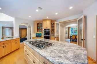 Large Center Island In Kitchen. Large Windows Overlooking The Private Backyard.