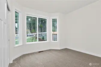 Room 2/ front bedroom with bay window. Photo for illustration only of similar home, not actual.