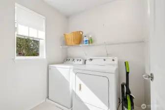 Room for supplies, broom & vacuum!  - Washer (new in 2023) & Dryer stay.