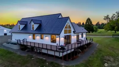 Such curb appeal and partial wrap around trex decking.