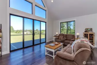 Vaulted ceiling and large windows to soak in the beauty.