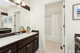 Up-stairs full bath for other 3 bedrooms w/ separate door for water closet and shower.