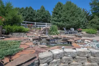 Soothing water feature and sitting area.. The view from here is captivating!
