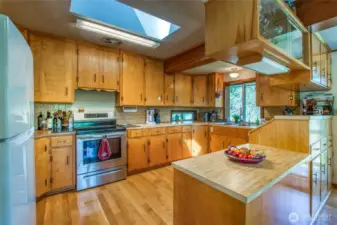 Lots for storage throughout the kitchen. Skylights open for added ventilation