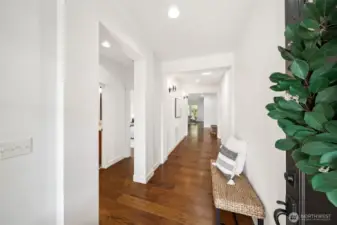 Entry way with the two guest bedrooms and full bath to the left