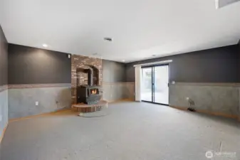 Basement Family Room with wood stove
