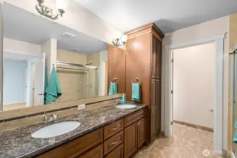 Primary bathroom with double sink and shower