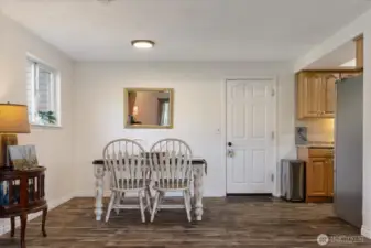 Dining room off of kitchen connects to living room.