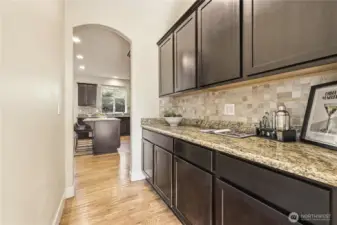 The butler's pantry off of the kitchen is a rare yet highly functional addition, providing even more storage and easy access to the front dining room