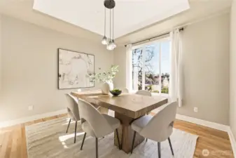 There's room for everyone to gather in the sun drenched dining room at the front of the home