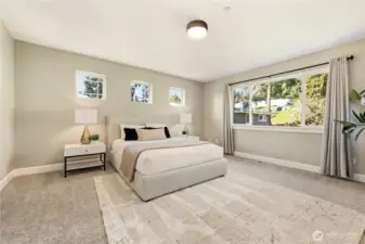 This generous primary suite provides space to relax and retreat at the end of a long day