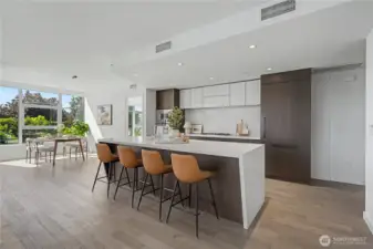 Quartz Waterfall Island Kitchen  Designer Finishes Throughout