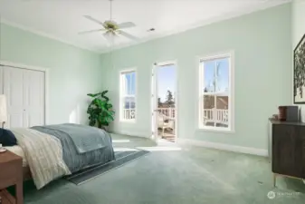 Primary Bedroom with balcony, virtually staged