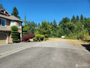 SW corner is NW of retention pond