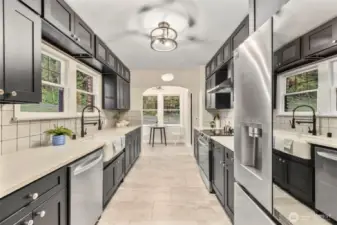 Quartz countertops, shaker cabinets and brand new appliances