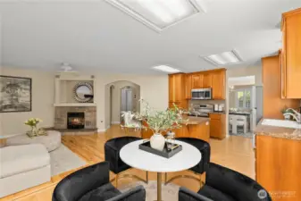 Island Kitchen opens to Nook & cozy Family Rm w/fireplace & built-ins