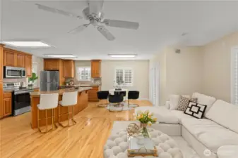 Kitchen flows seamlessly to Family Room