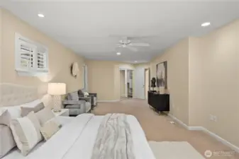 Primary Suite w/Walk-in closet + two extra his/her closets