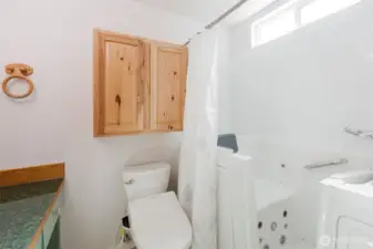 Primary bath. Features walk-in tub