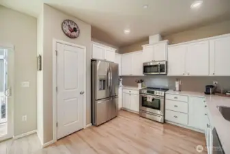 Pantry also found within kitchen.