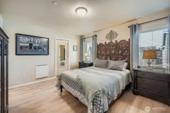 Upstairs, primary suite has a walk-in closet and private bath.