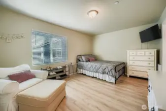 Second bedroom on 3rd level is gracious in size and also enjoys a bath within.