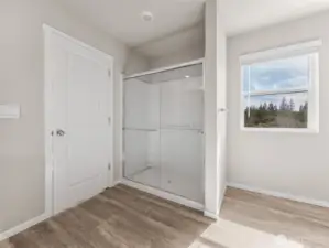Primary bathroom shower.  Finishes and options will vary.