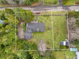 Lines are approximate & show oversized lot that comes with sale of home along with smaller lot that is being sold separately.