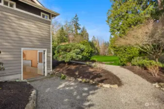 Heated basement with enough room for golf carts, right on the path to the course.